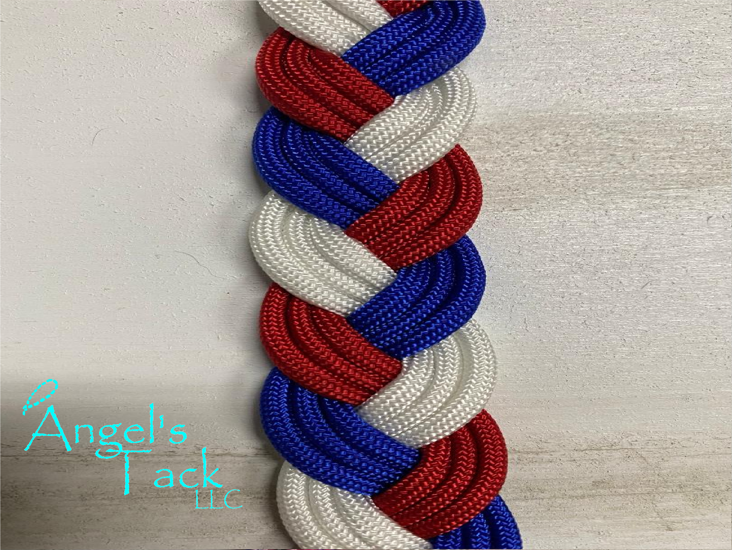 Red white and blue braided paracord barrel reins, close up