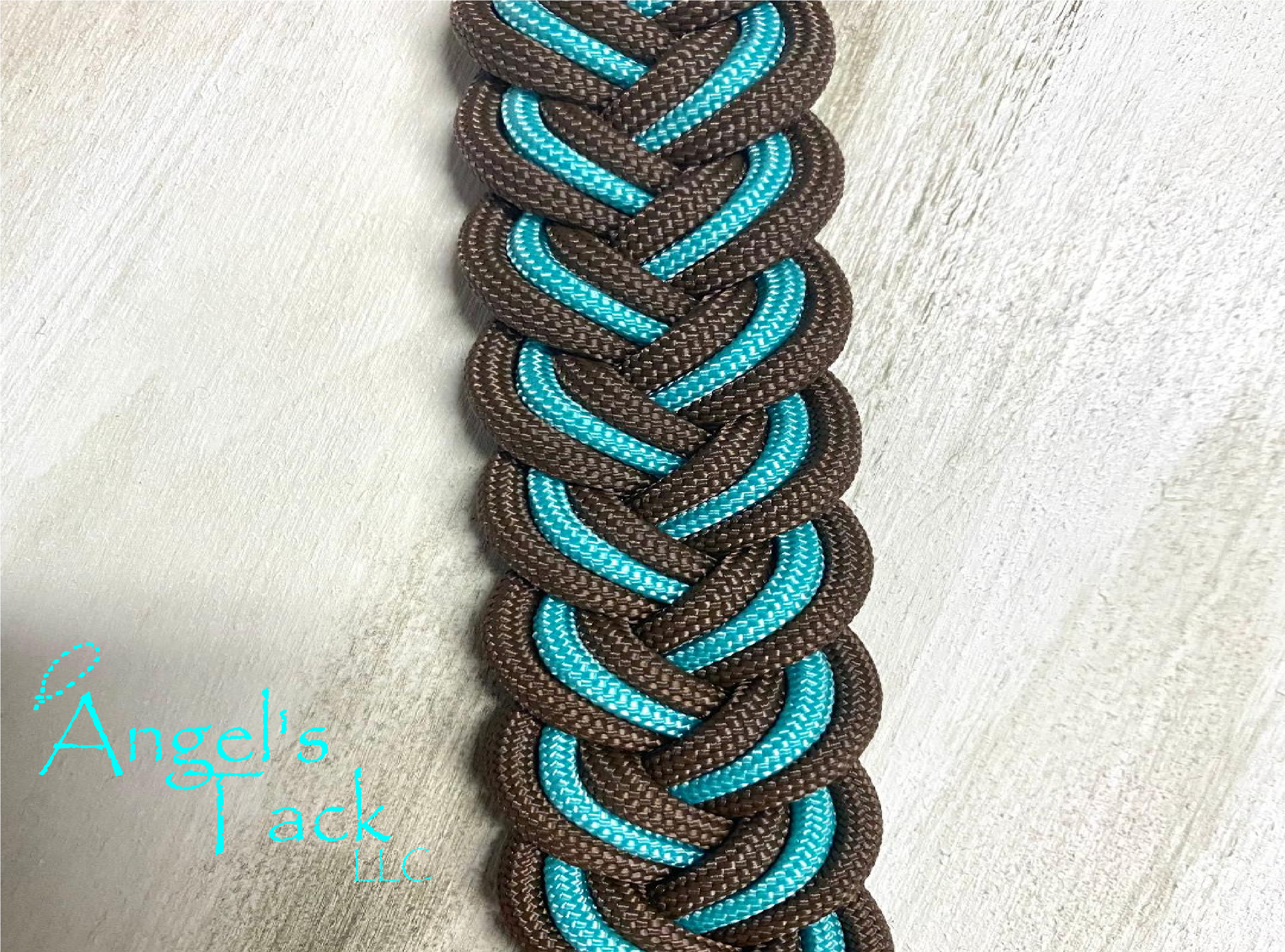 Brown and turquoise barrel reins, close up