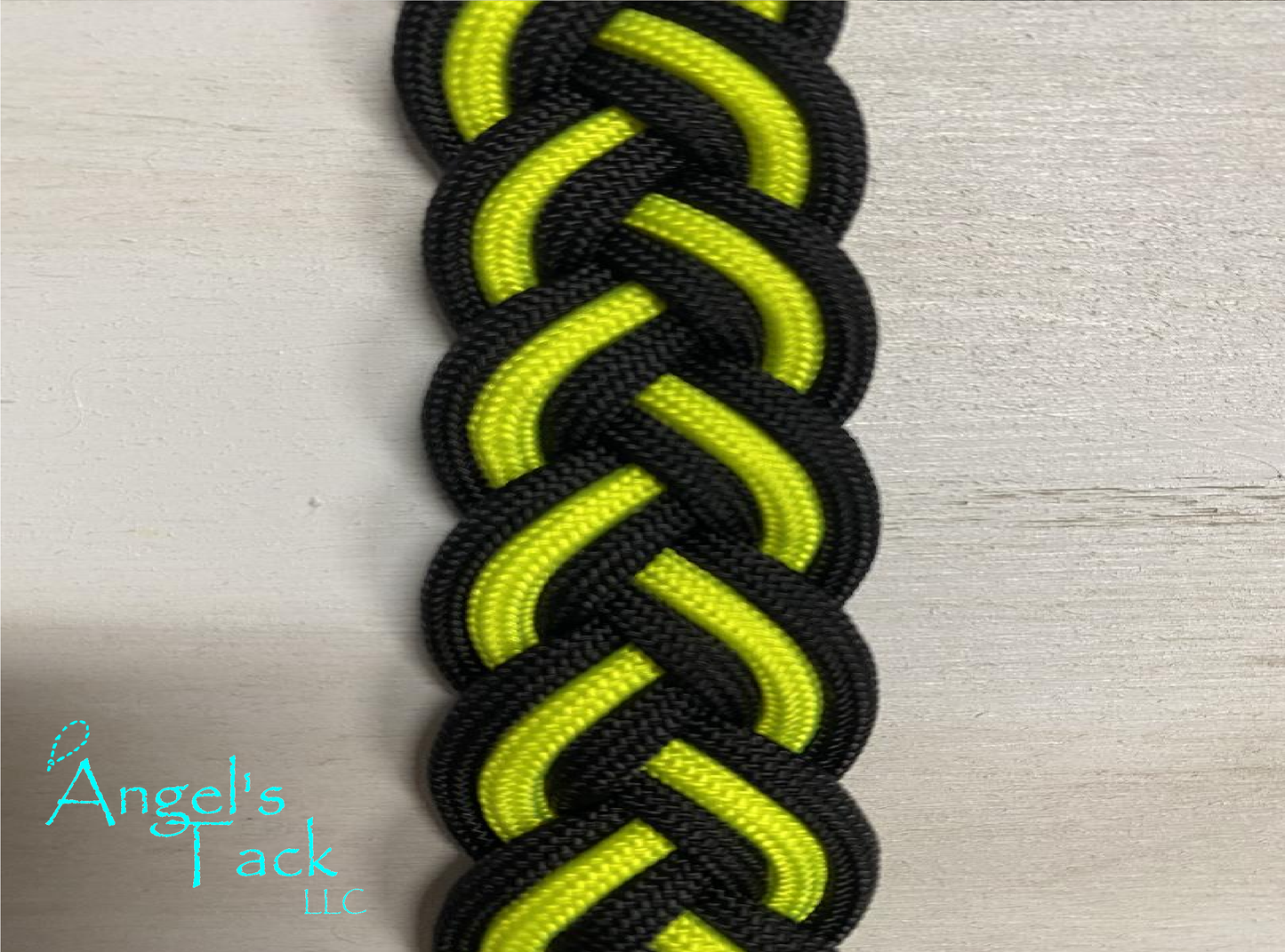 Neon yellow and black barrel reins, close up