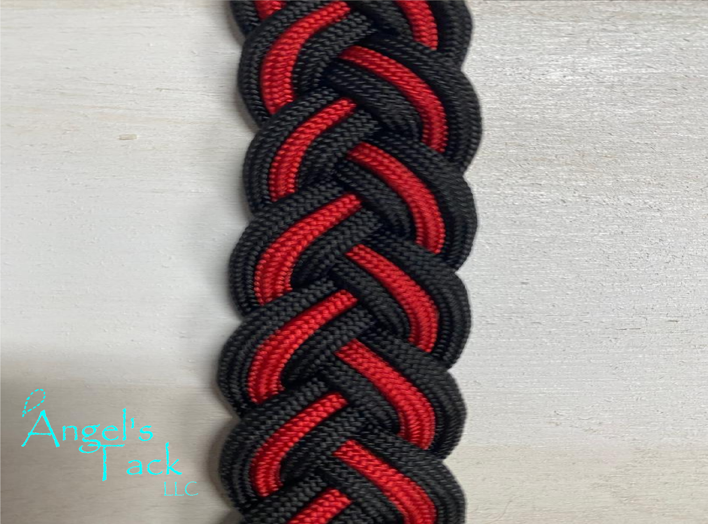 Red and black barrel reins, close up