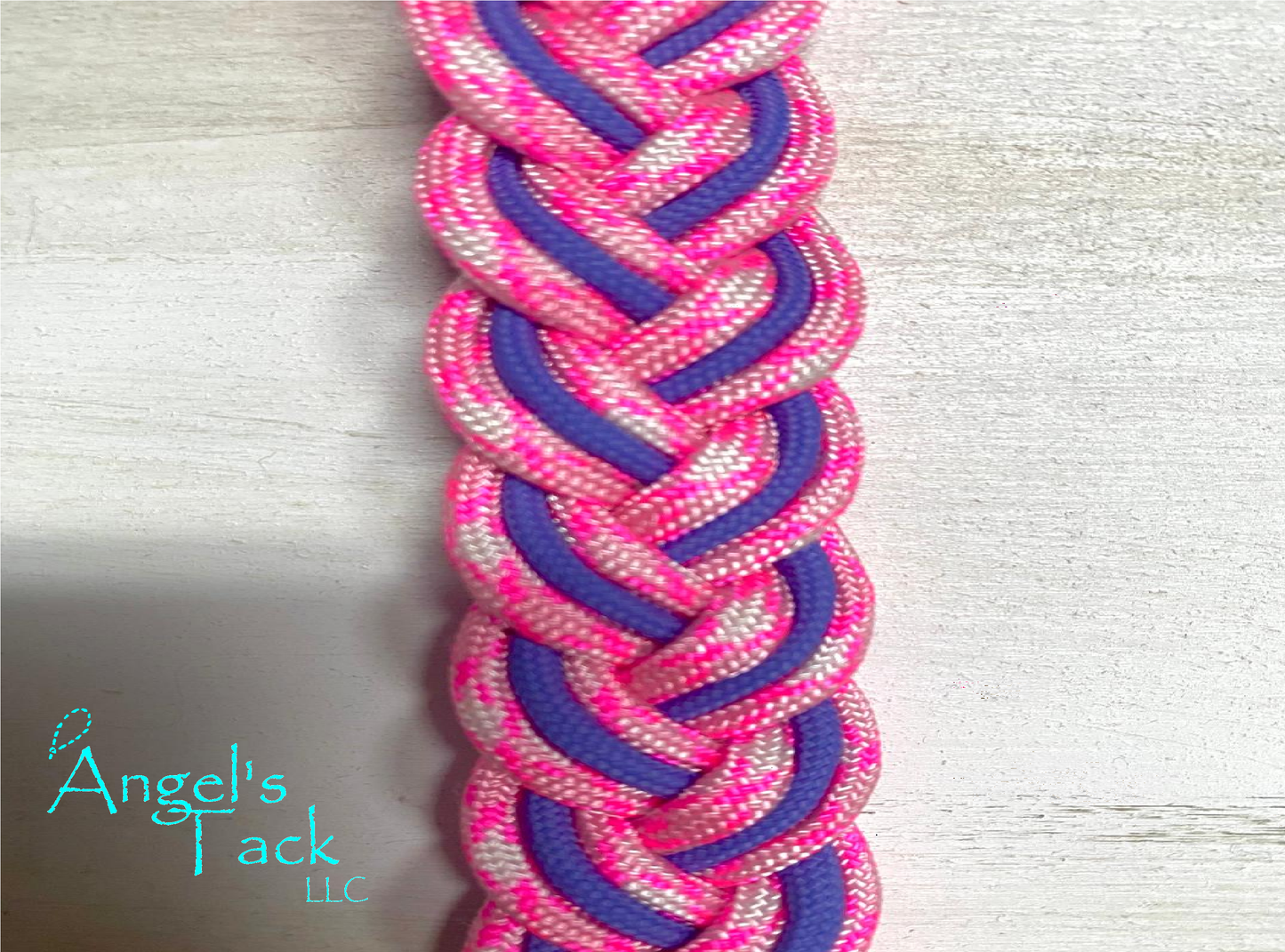 Hot pink and purple barrel reins, close up