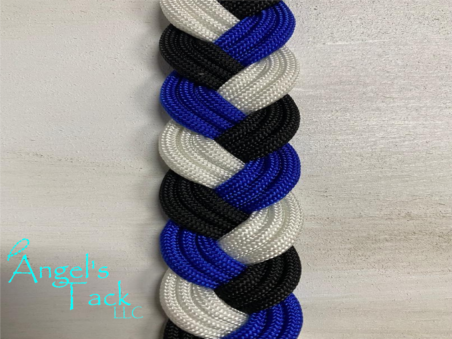 Royal blue black and white barrel reins, close up