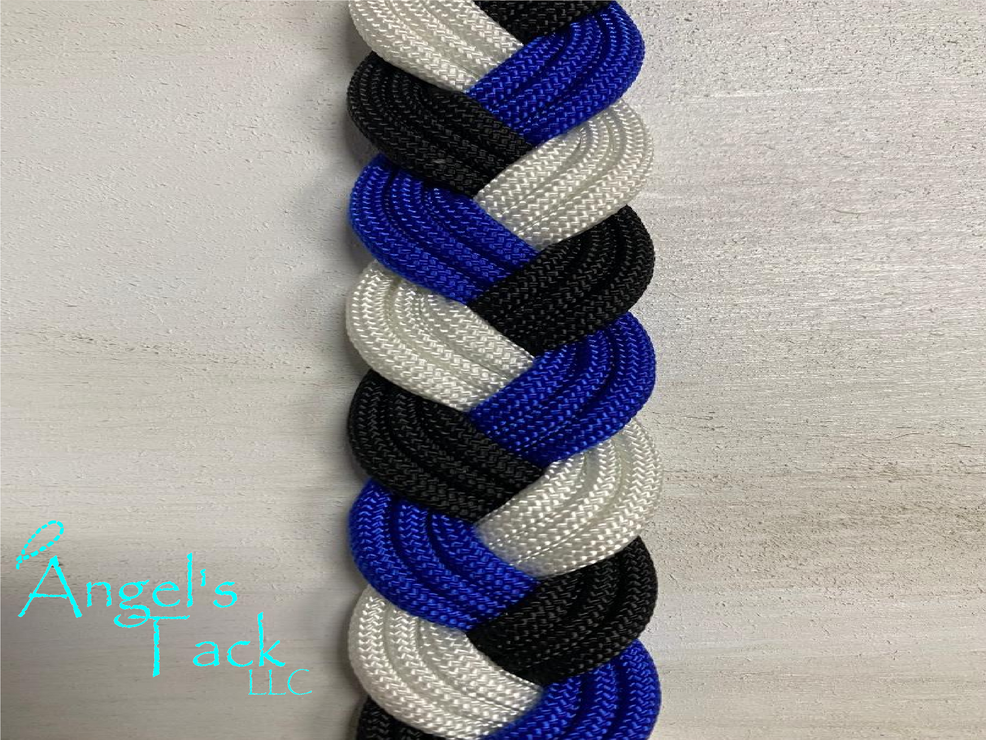 Royal blue black and white barrel reins, close up