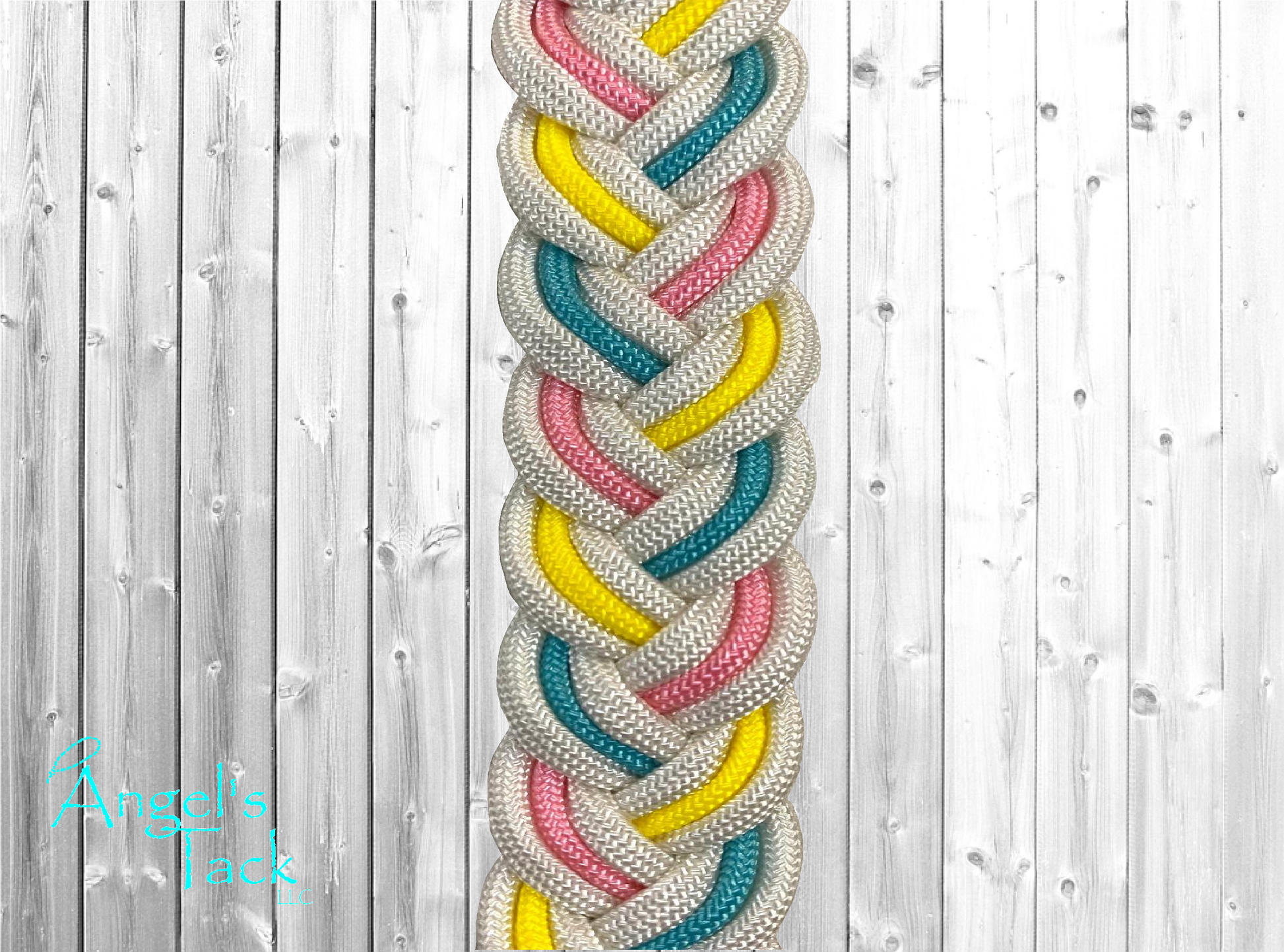 White blue pink and yellow barrel reins, close up