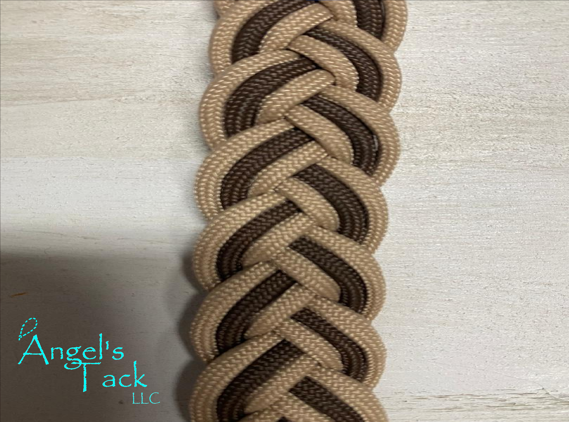 Tan and brown barrel reins, close up