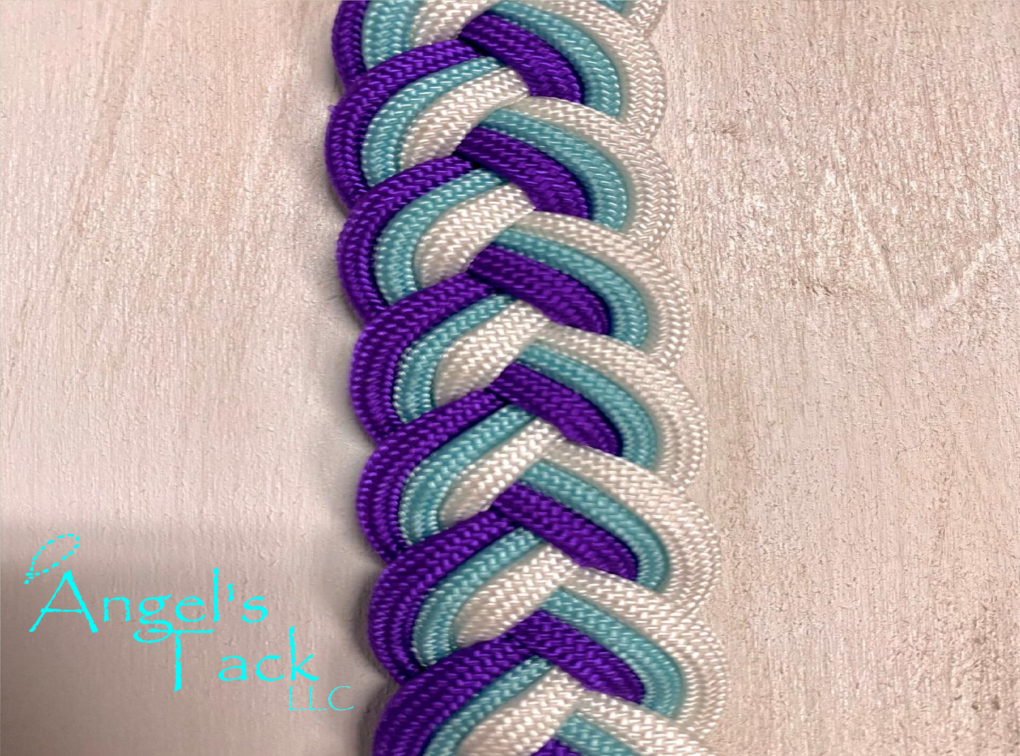 Turquoise purple and white barrel reins, close up