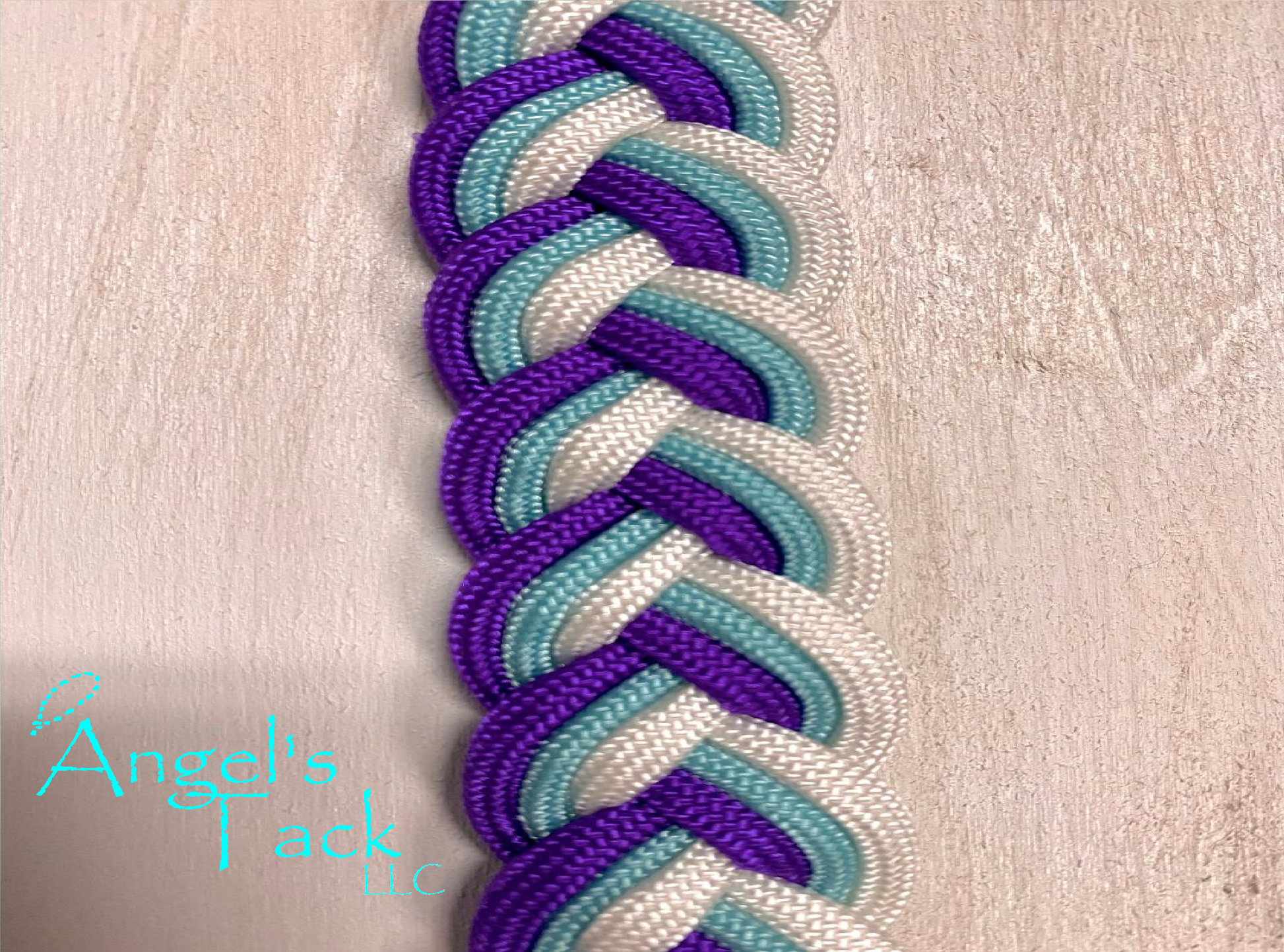 Turquoise purple and white barrel reins, close up