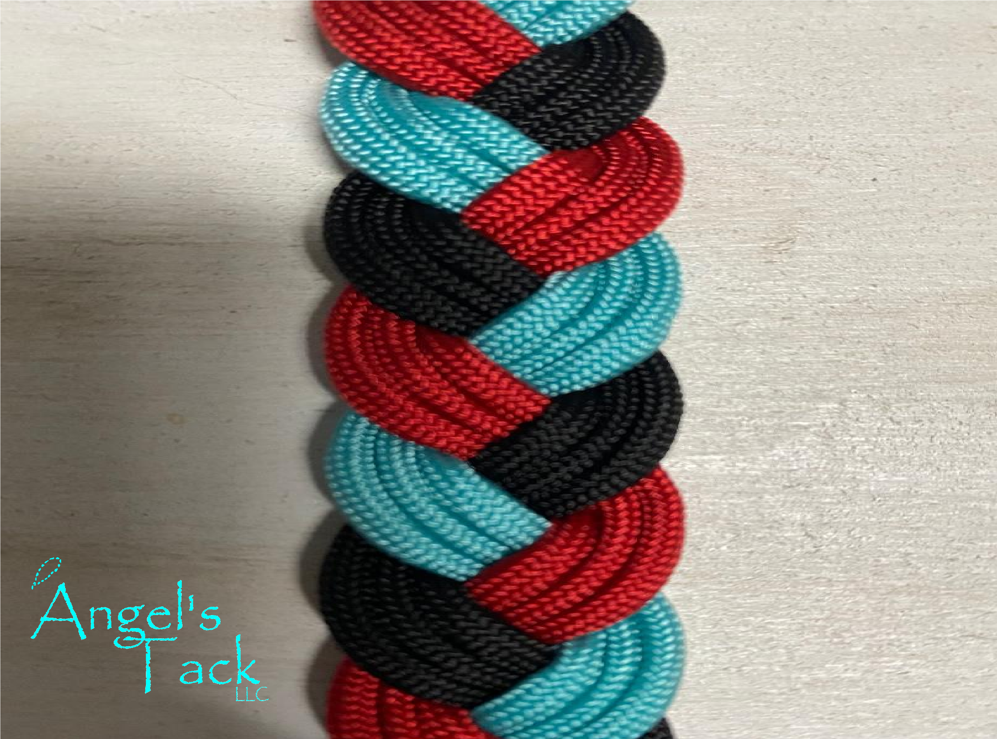 Turquoise red and lack barrel reins, close up