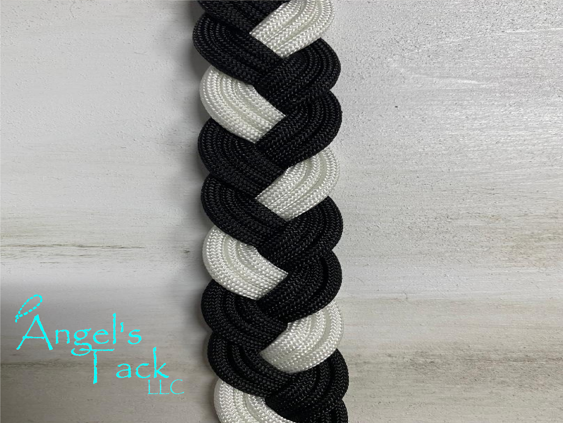 Black and white barrel reins, close up