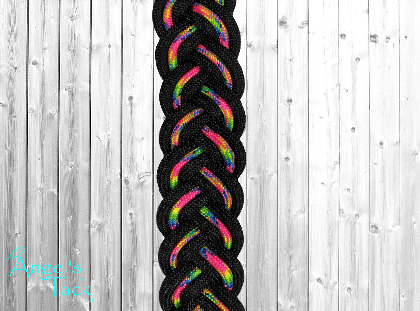 Hot pink and black barrel reins, close up