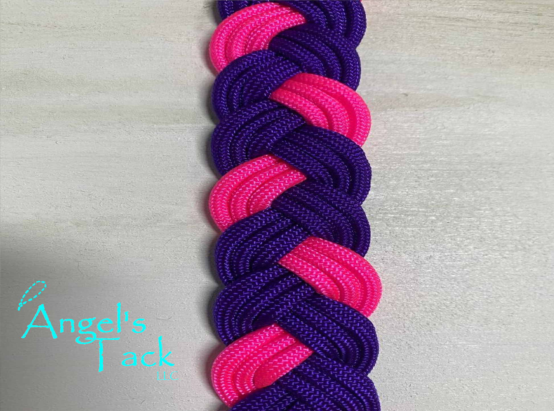 Hot pink and purple barrel reins, close up