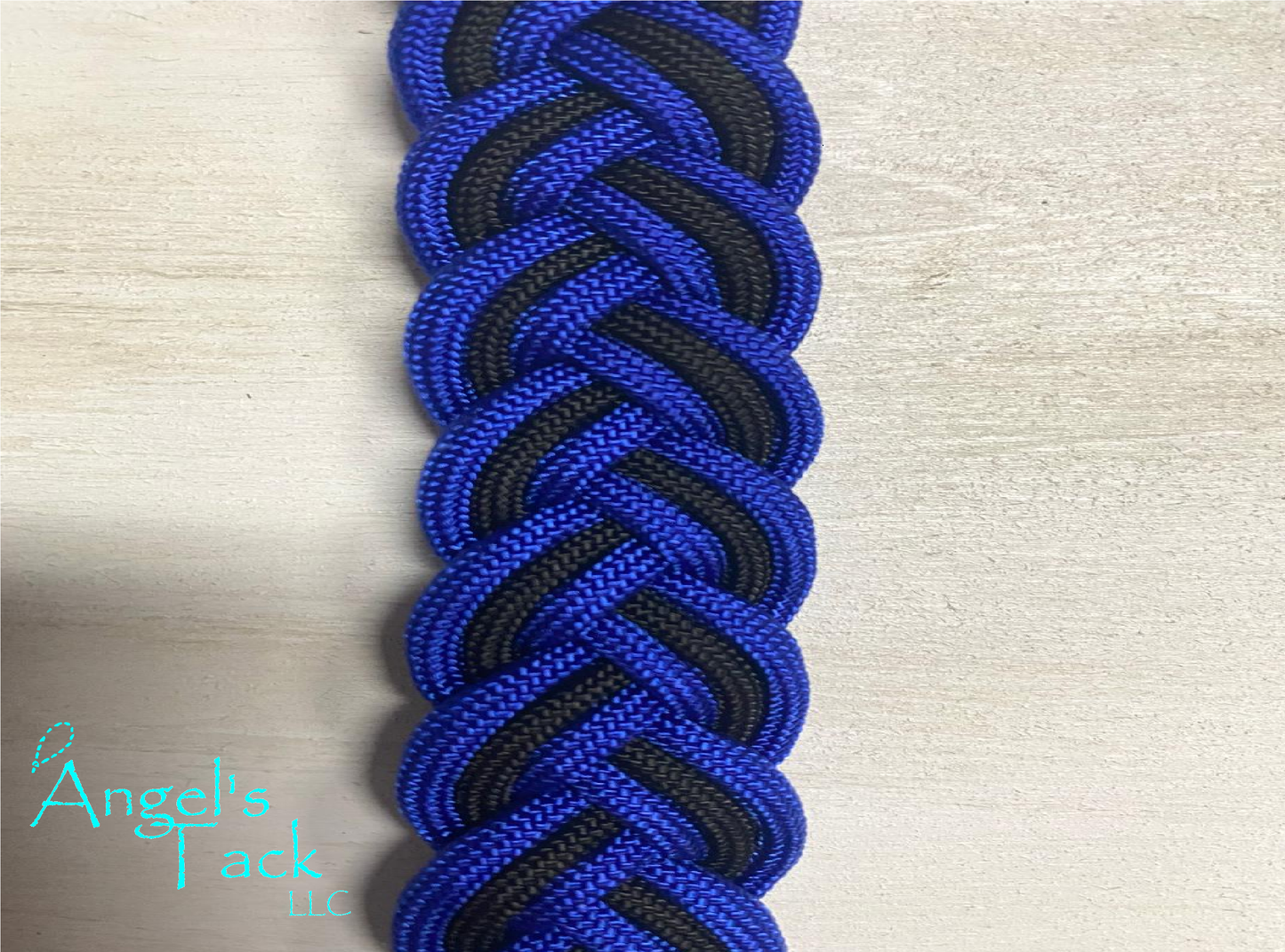 Royal blue and black barrel reins, close up
