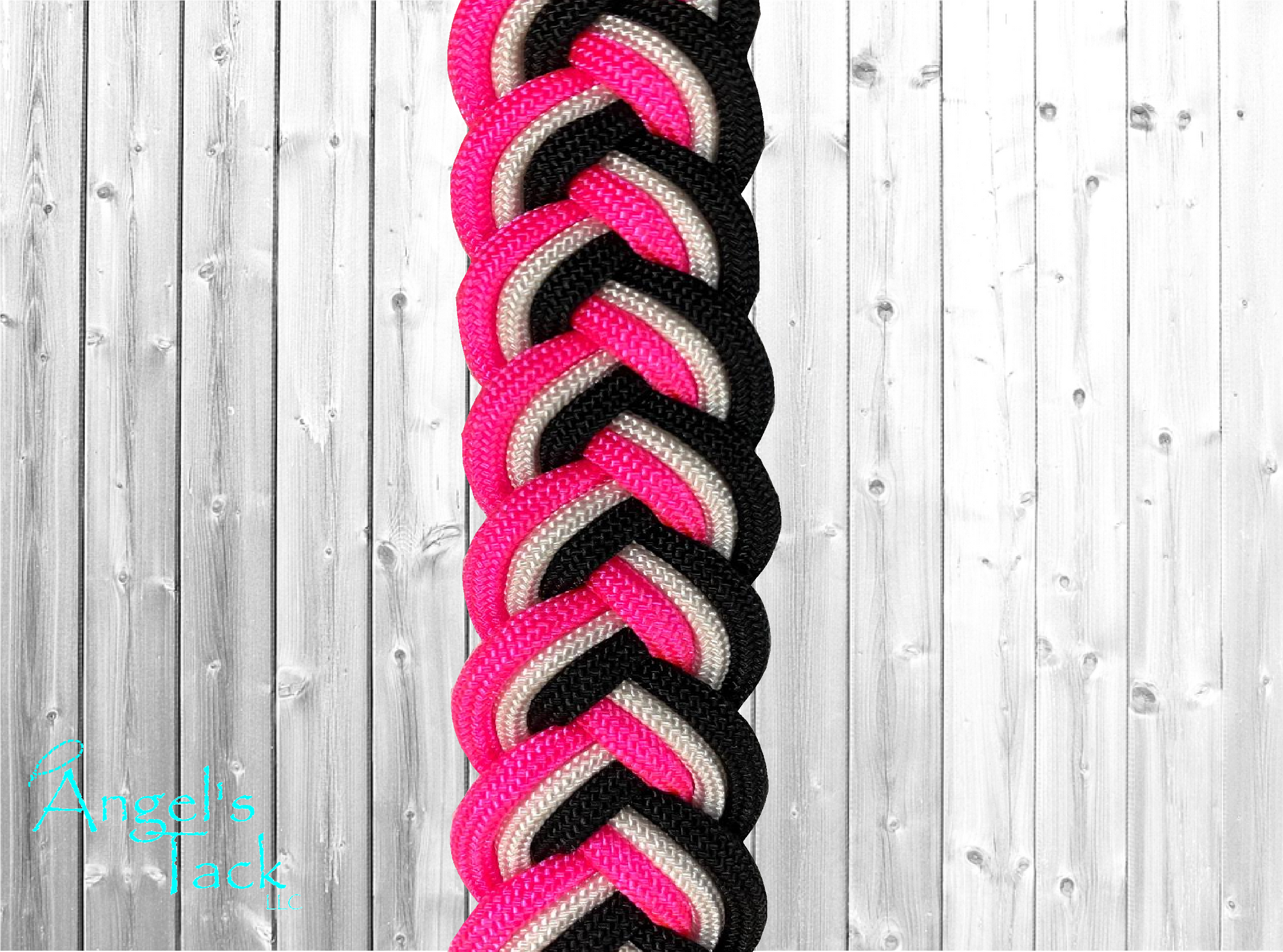 Hot pink black and white barrel reins, close up