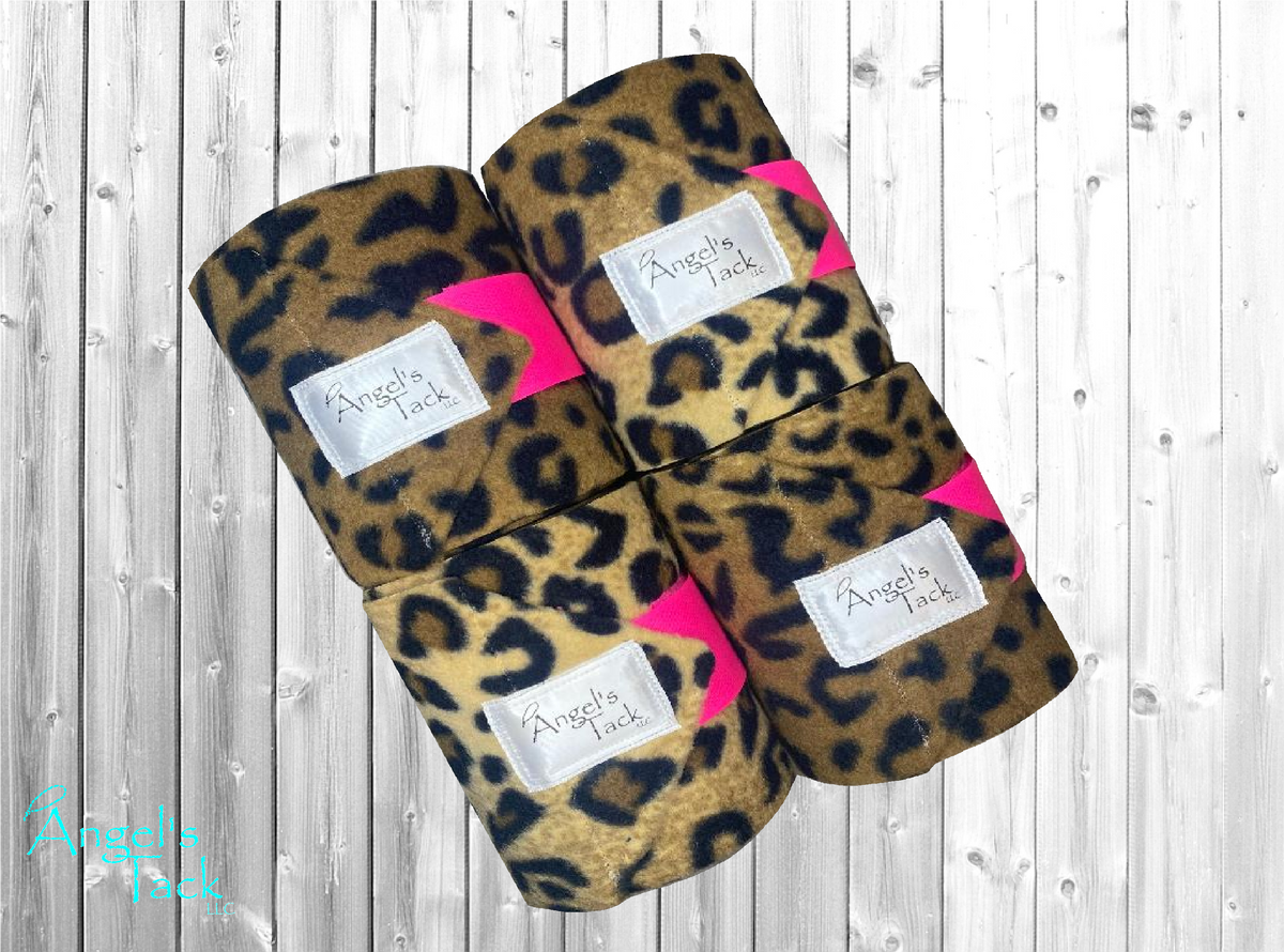 A set of four leopard print horse polos with hot pink velcro by Angel's Tack LLC.