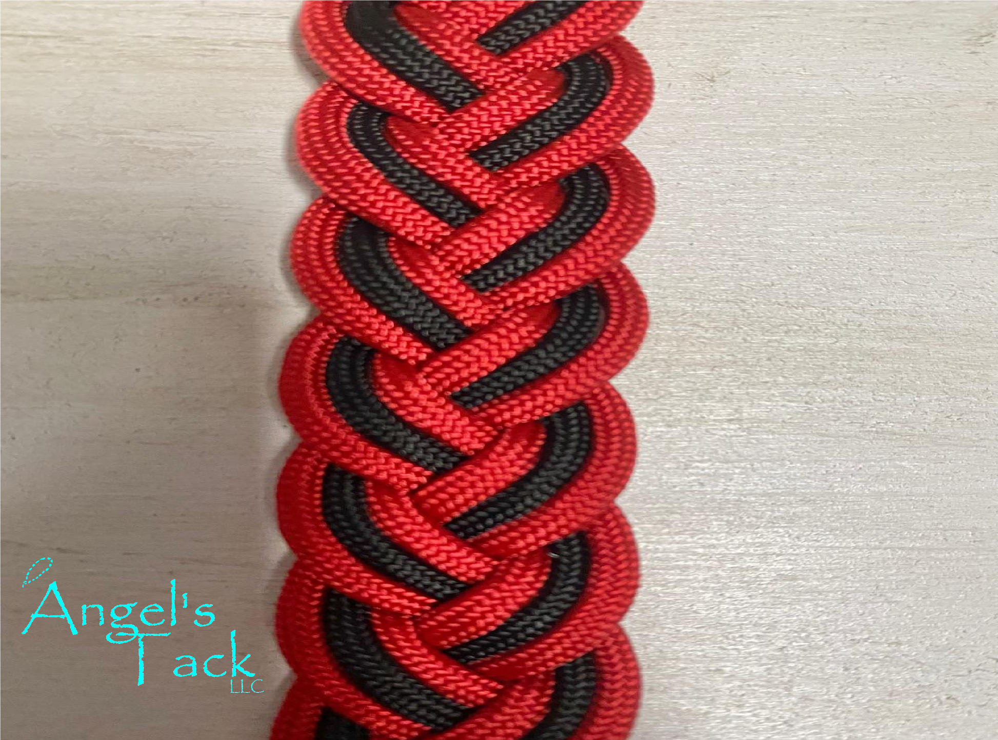 Red and black barrel reins, close up