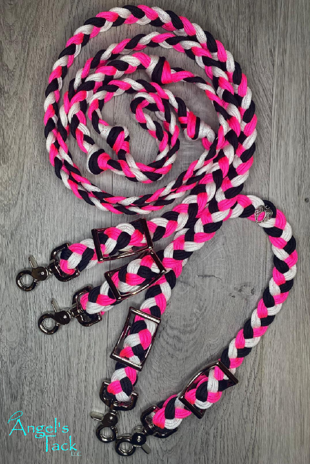 Hot pink, black, and white checker barrel reins and wither strap set, vertical