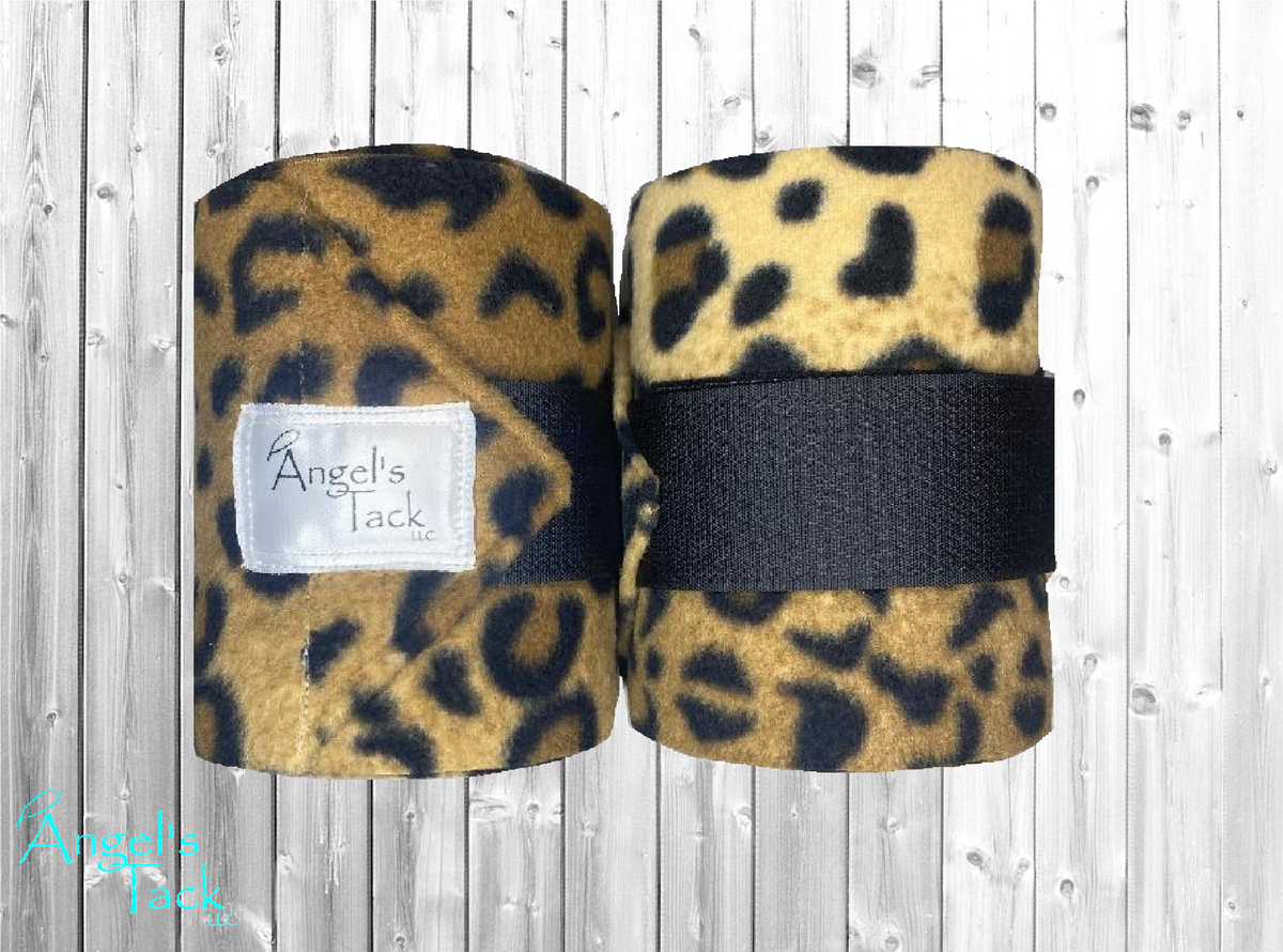 A pair of leopard print horse polo wraps by Angel's Tack LLC.