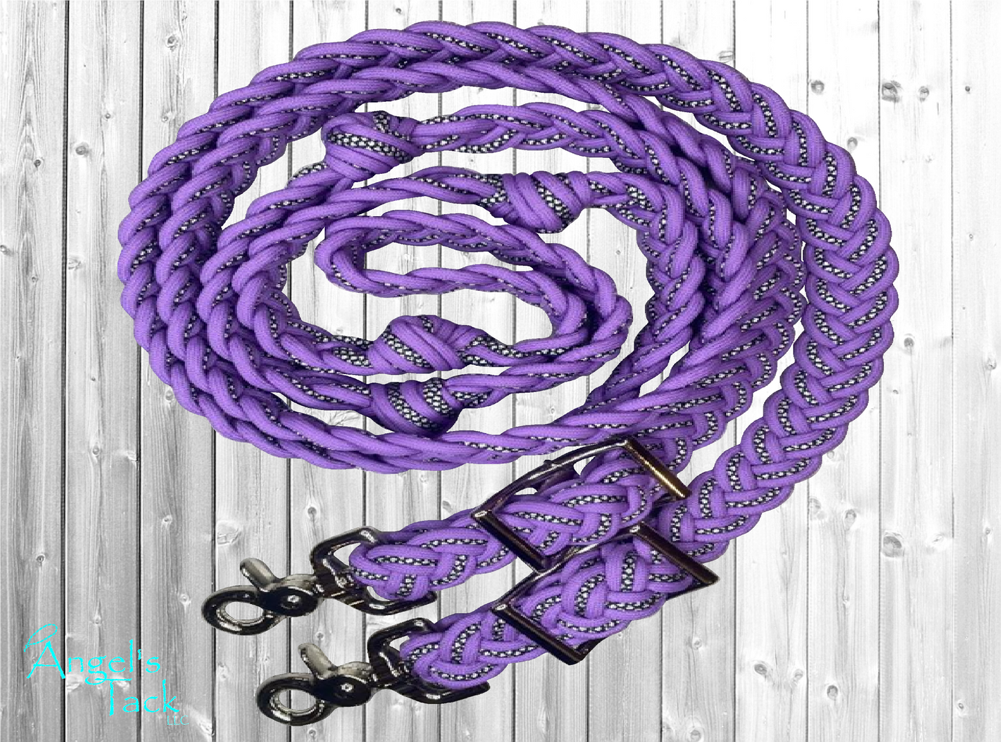 Light purple braided barrel reins with a diamond pattern on a wood background.