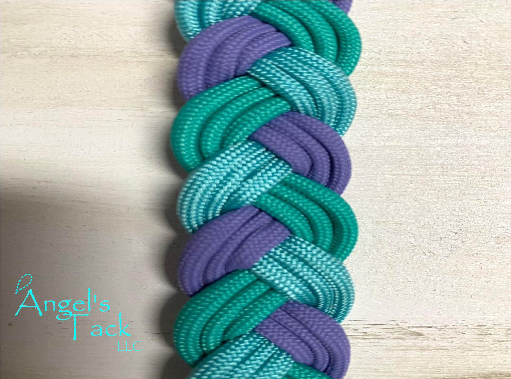 Turquoise teal and purple barrel reins, close up