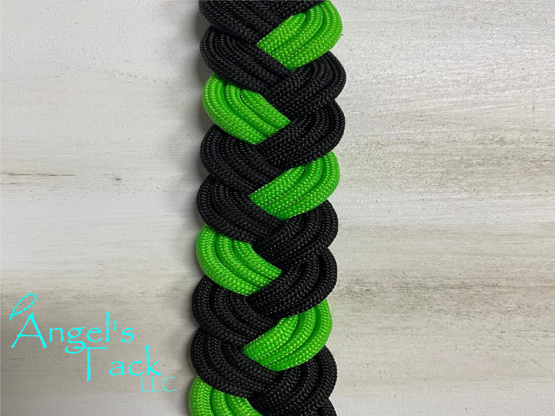 Neon green and black barrel reins, close up