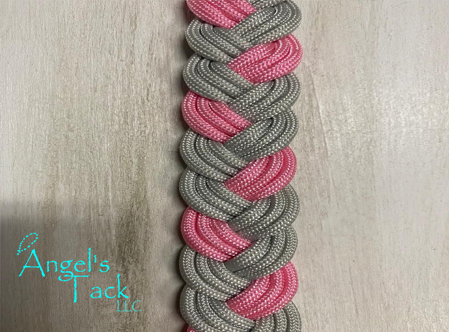 Pink and grey barrel reins, close up