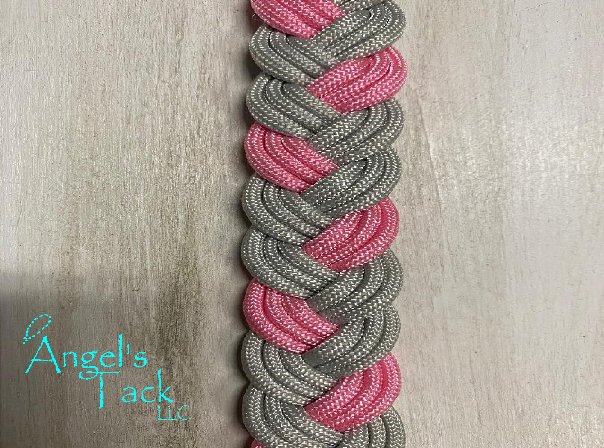 Pink and grey barrel reins, close up